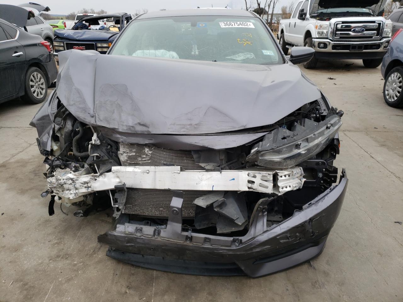 Photo 7 from auction – 2018 HONDA CIVIC LX with VIN 19XFC2F54JE018199