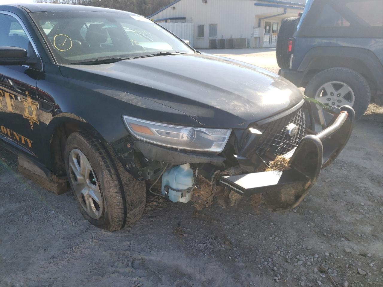 Photo 9 from auction – 2014 FORD TAURUS POL with VIN 1FAHP2MT3EG116120