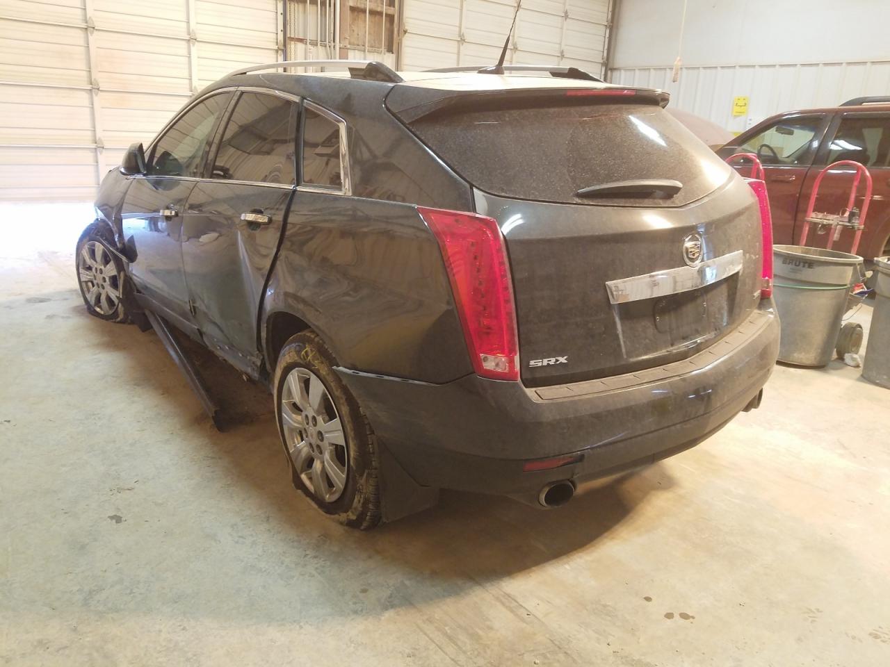 Photo 3 from auction – 2014 CADILLAC SRX LUXURY with VIN 3GYFNBE35ES565624