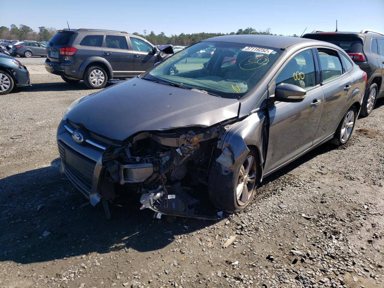 Photo 2 from auction – 2013 FORD FOCUS SE with VIN 1FADP3F23DL174713