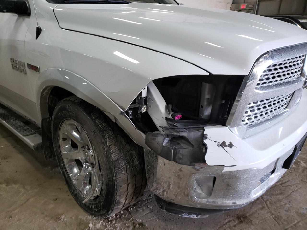 Photo 9 from auction – 2015 RAM 1500 LARAM with VIN 1C6RR7JM4FS744499