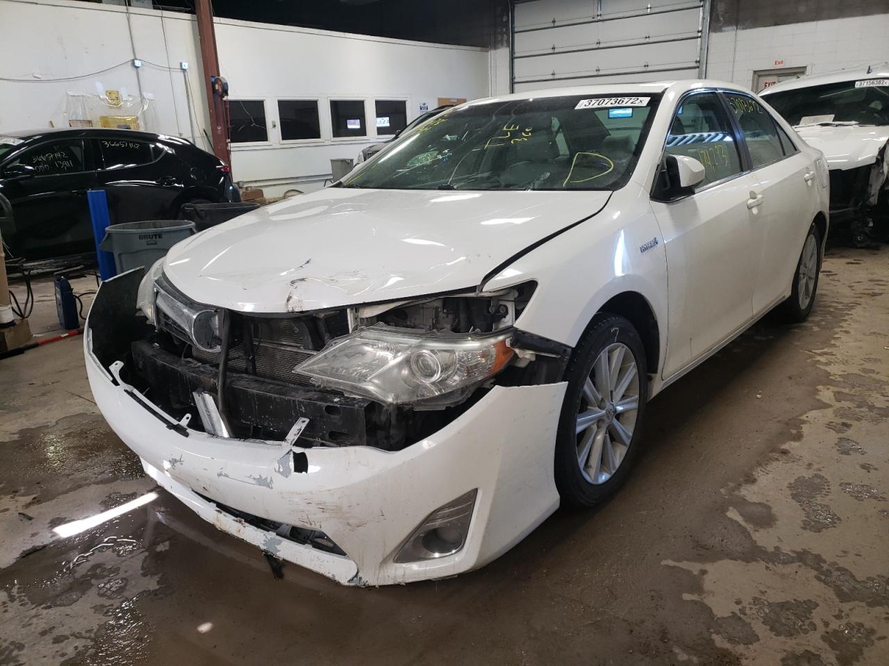 Photo 2 from auction – 2012 TOYOTA CAMRY HYBR with VIN 4T1BD1FK2CU057630