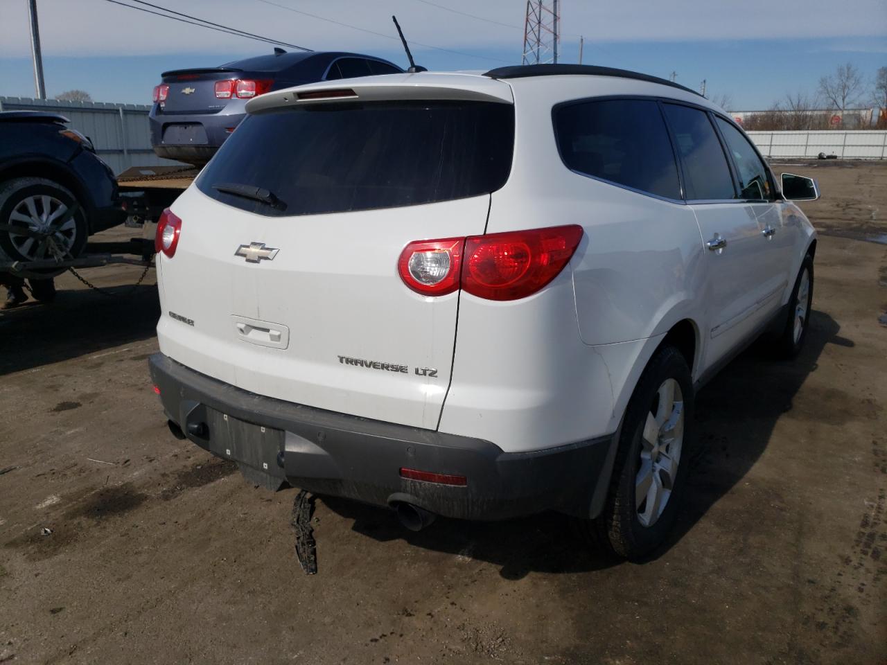 Photo 4 from auction – 2009 CHEVROLET TRAVERSE L with VIN 1GNEV33D29S100696