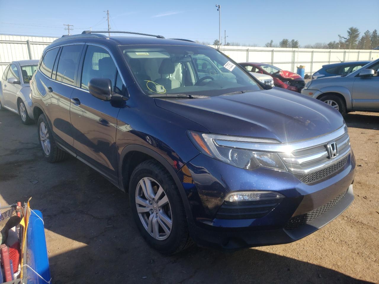 HONDA PILOT LX 2018 with VIN 5FNYF6H18JB040086 - Photo from auction
