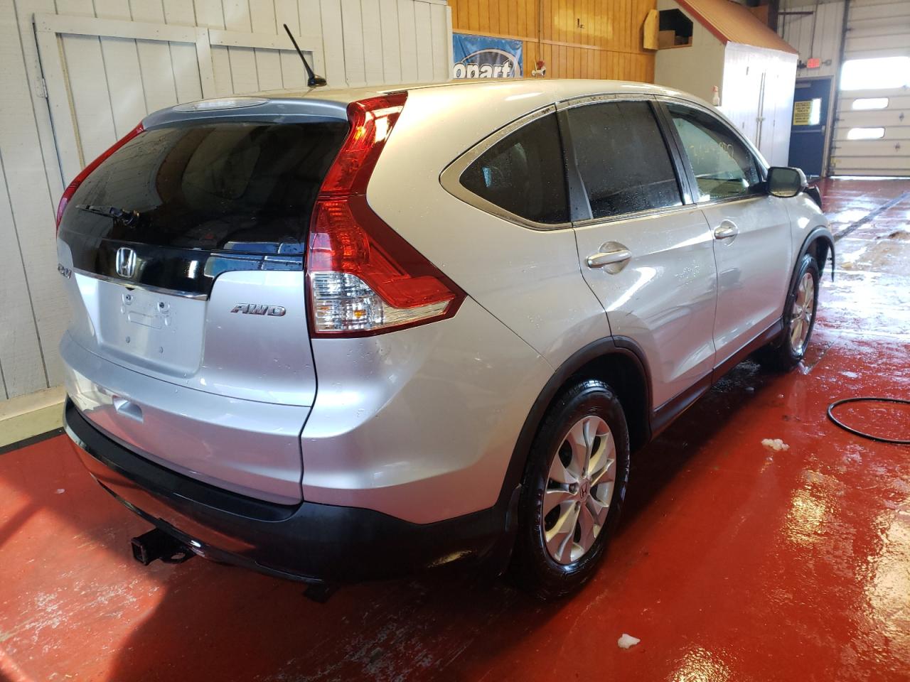 Photo 4 from auction – 2013 HONDA CR-V EX with VIN 2HKRM4H53DH647004