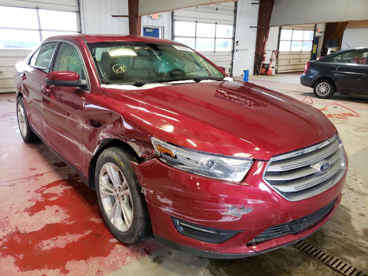 FORD TAURUS SEL 2014 with VIN 1FAHP2E88EG130895 - Photo from auction