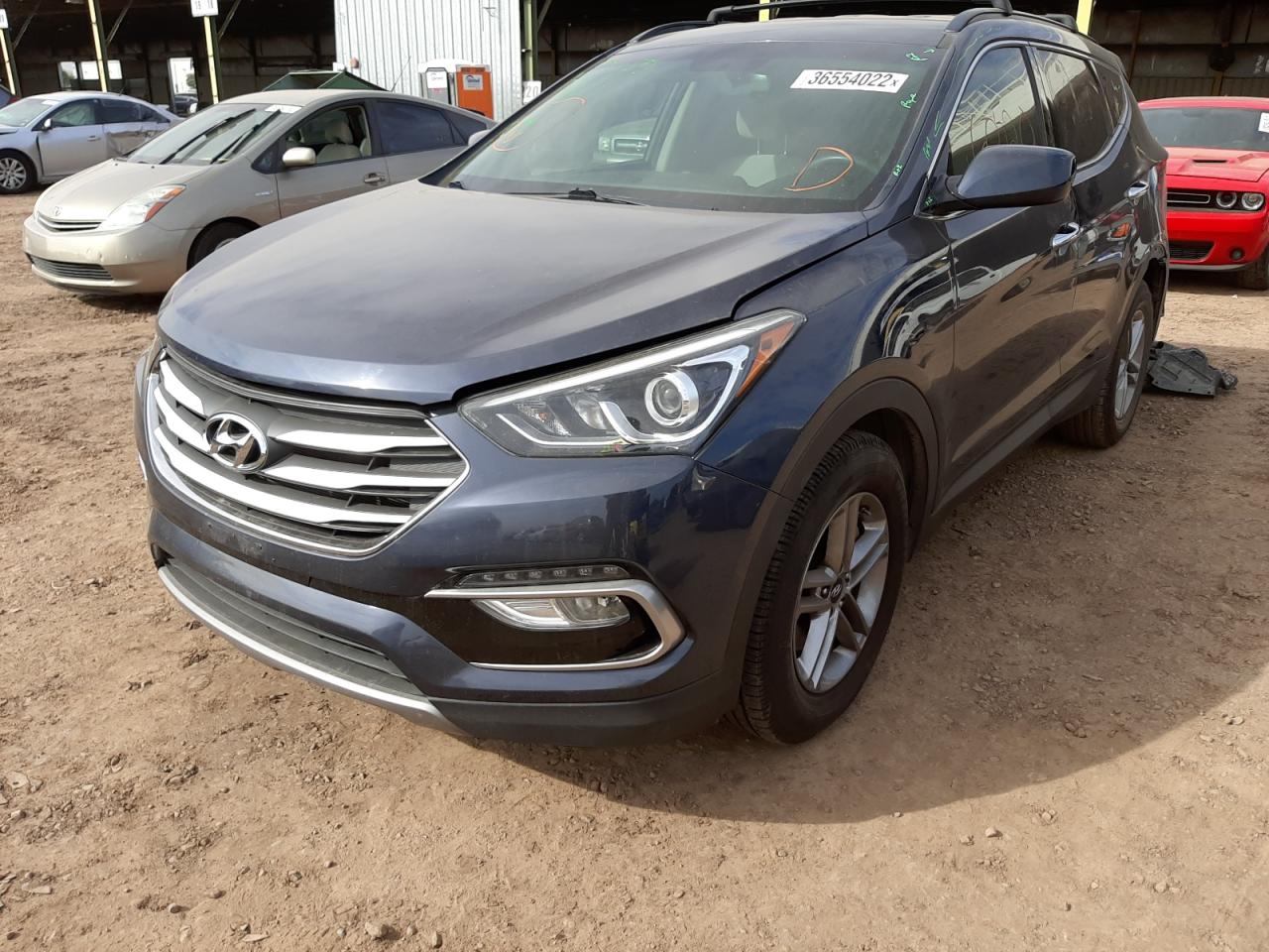 Photo 2 from auction – 2017 HYUNDAI SANTA FE S with VIN 5NMZU3LB3HH017641