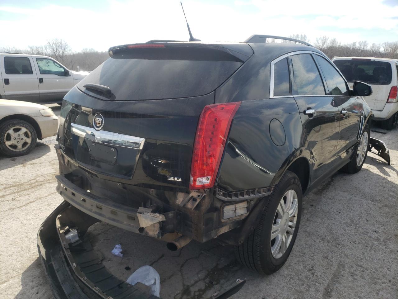 Photo 4 from auction – 2013 CADILLAC SRX with VIN 3GYFNAE35DS609372
