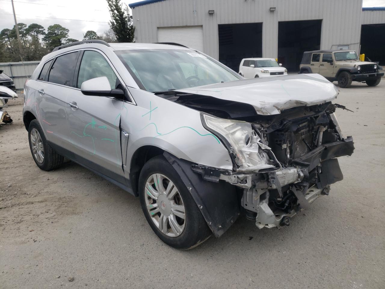 CADILLAC SRX 2014 with VIN 3GYFNAE35ES637724 - Photo from auction