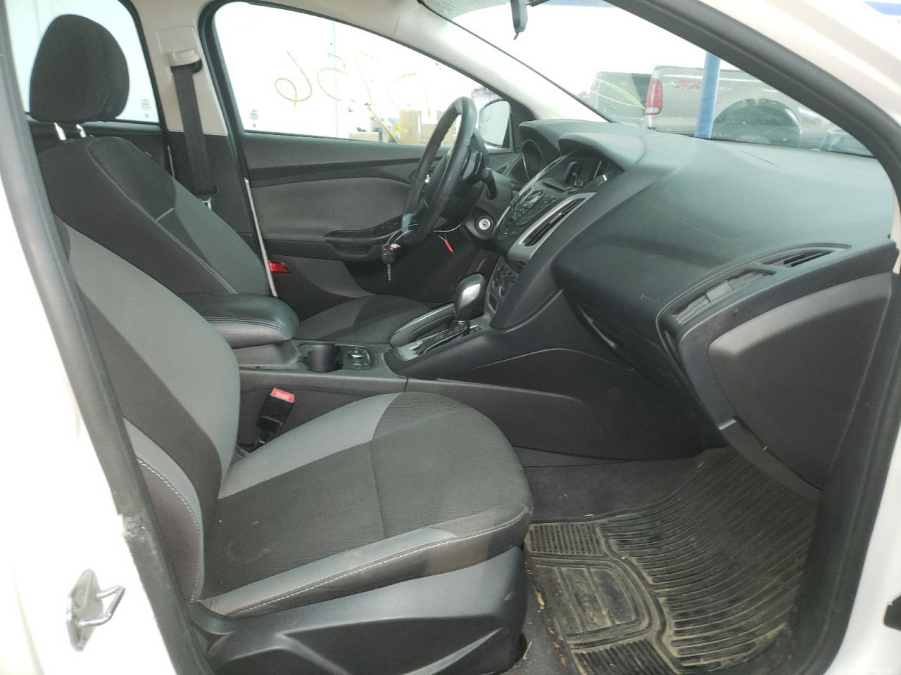 Photo 5 from auction – 2013 FORD FOCUS SE with VIN 1FADP3F20DL382788