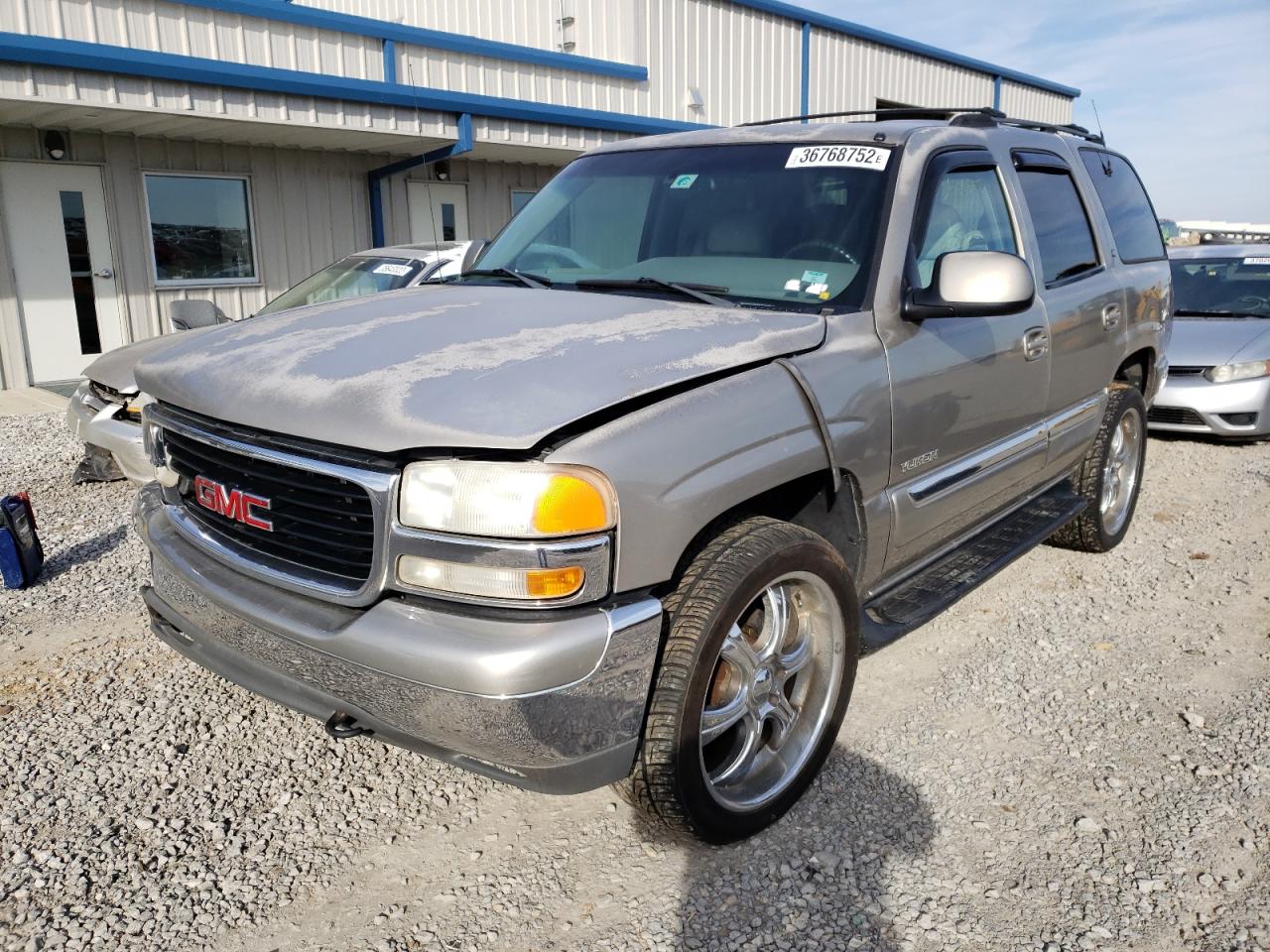 Photo 2 from auction – 2000 GMC YUKON with VIN 1GKEK13TXYJ131734