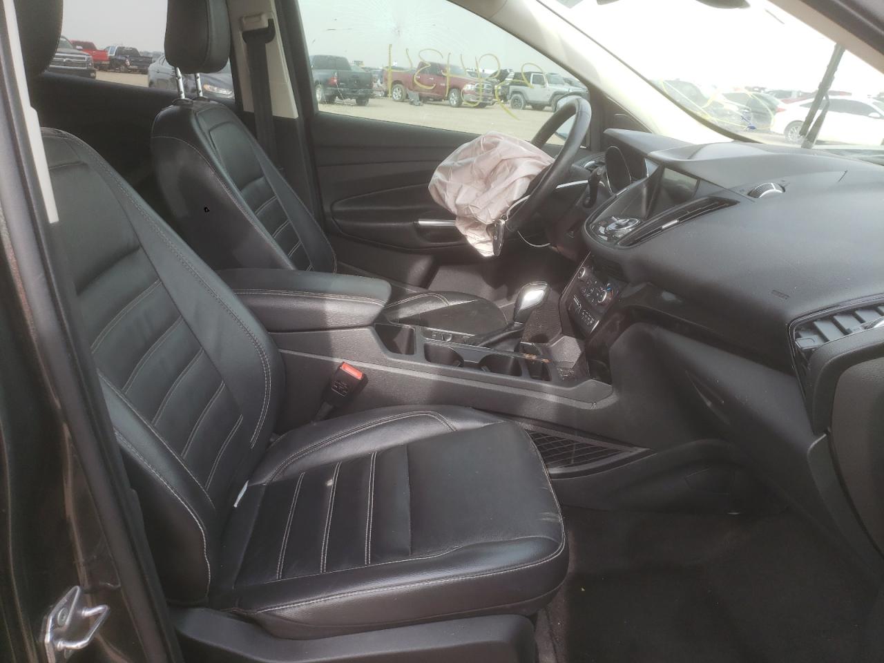 Photo 5 from auction – 2019 FORD ESCAPE TIT with VIN 1FMCU9J93KUB85851