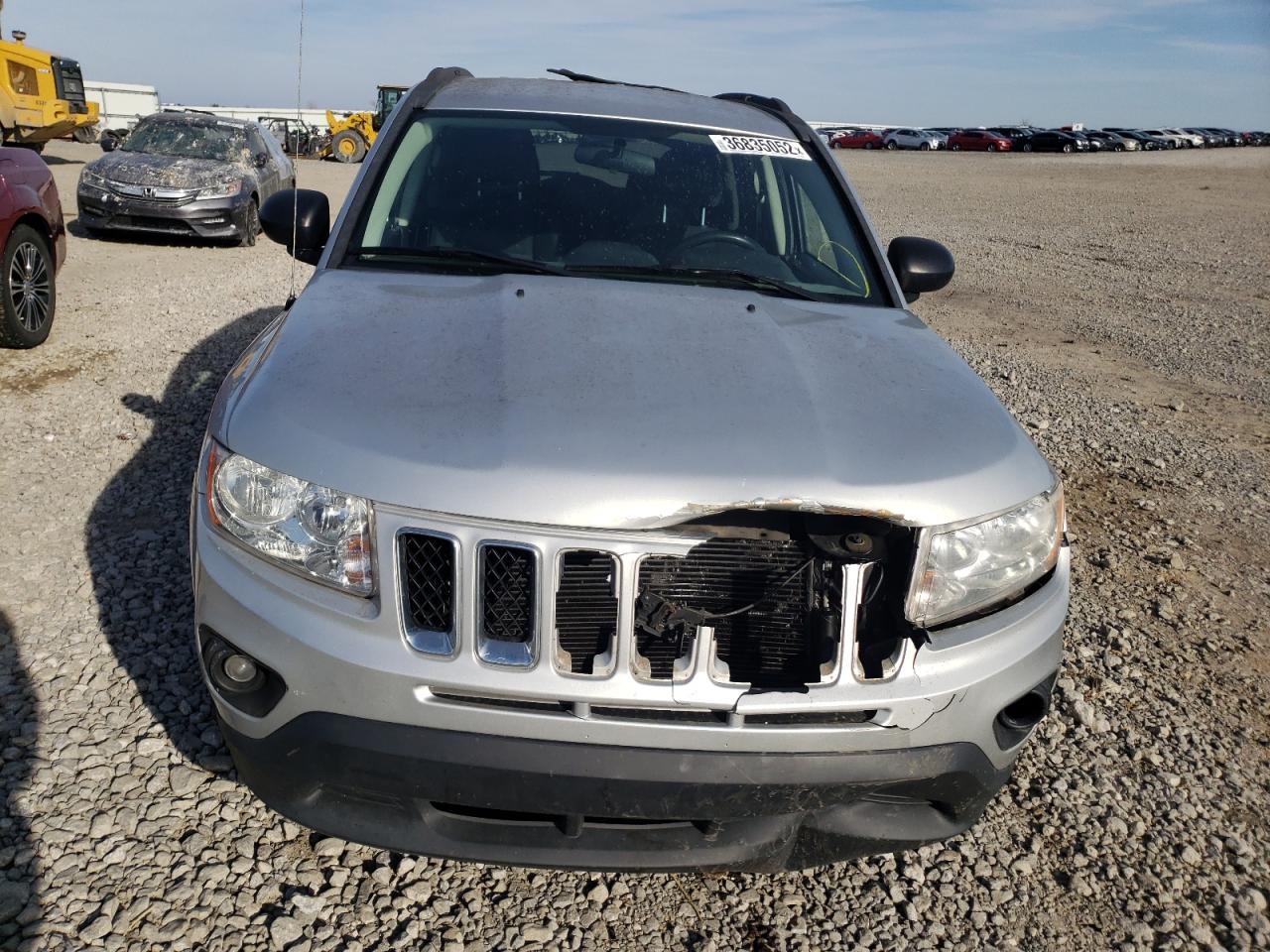 Photo 9 from auction – 2013 JEEP COMPASS LA with VIN 1C4NJDEB9DD233801