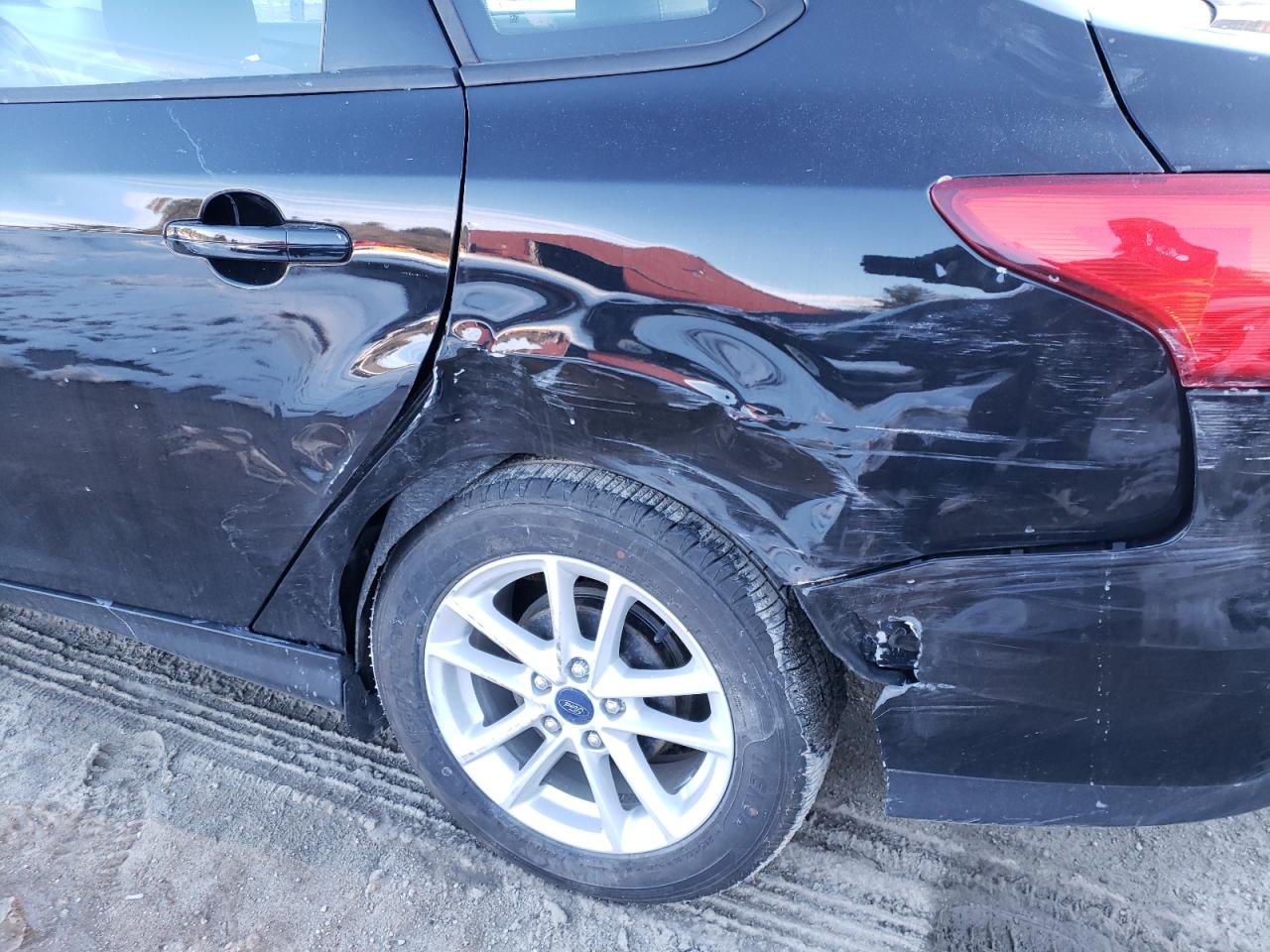 Photo 9 from auction – 2016 FORD FOCUS SE with VIN 1FADP3F25GL353906