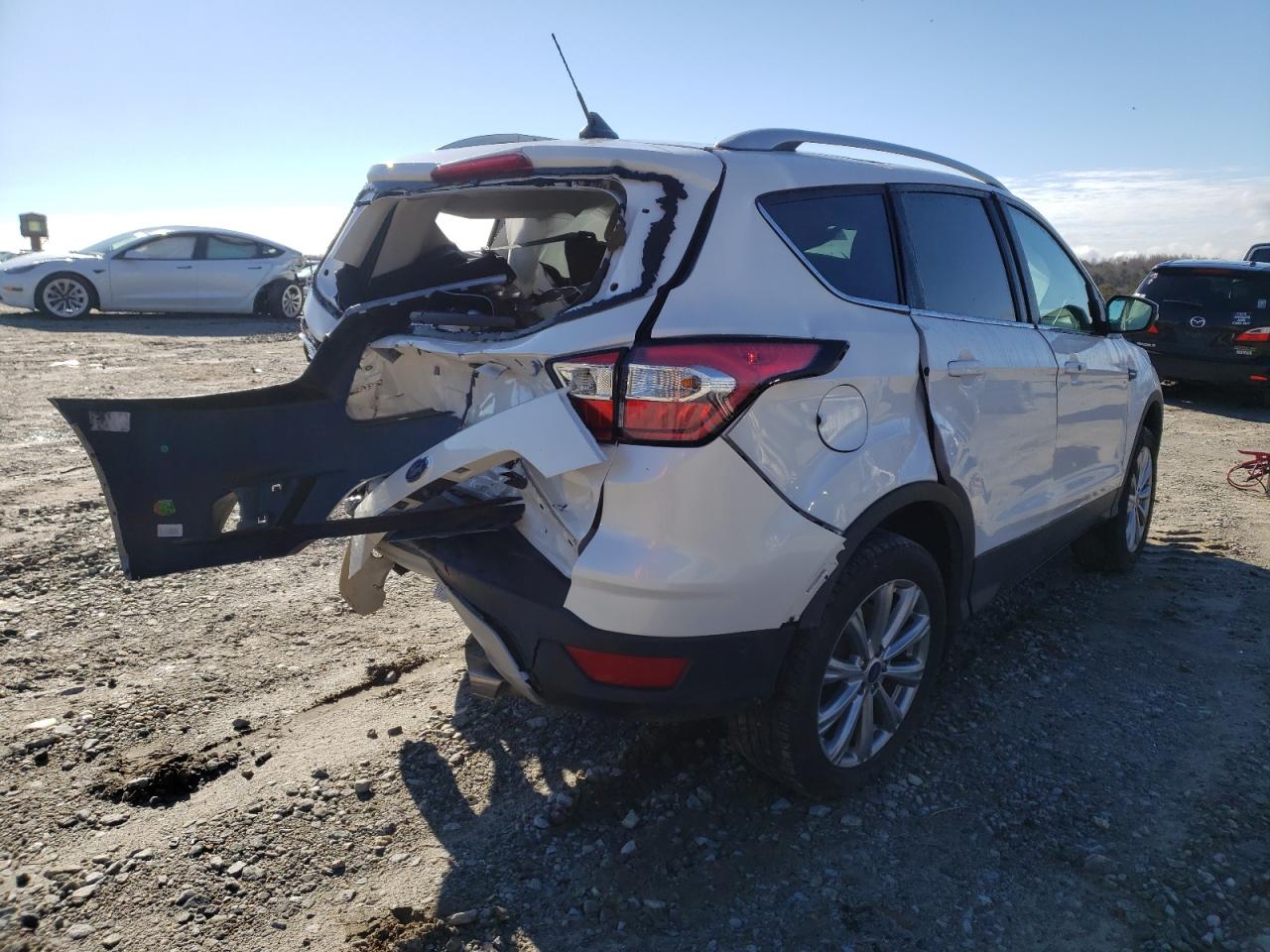 Photo 4 from auction – 2018 FORD ESCAPE TIT with VIN 1FMCU0J94JUC75486