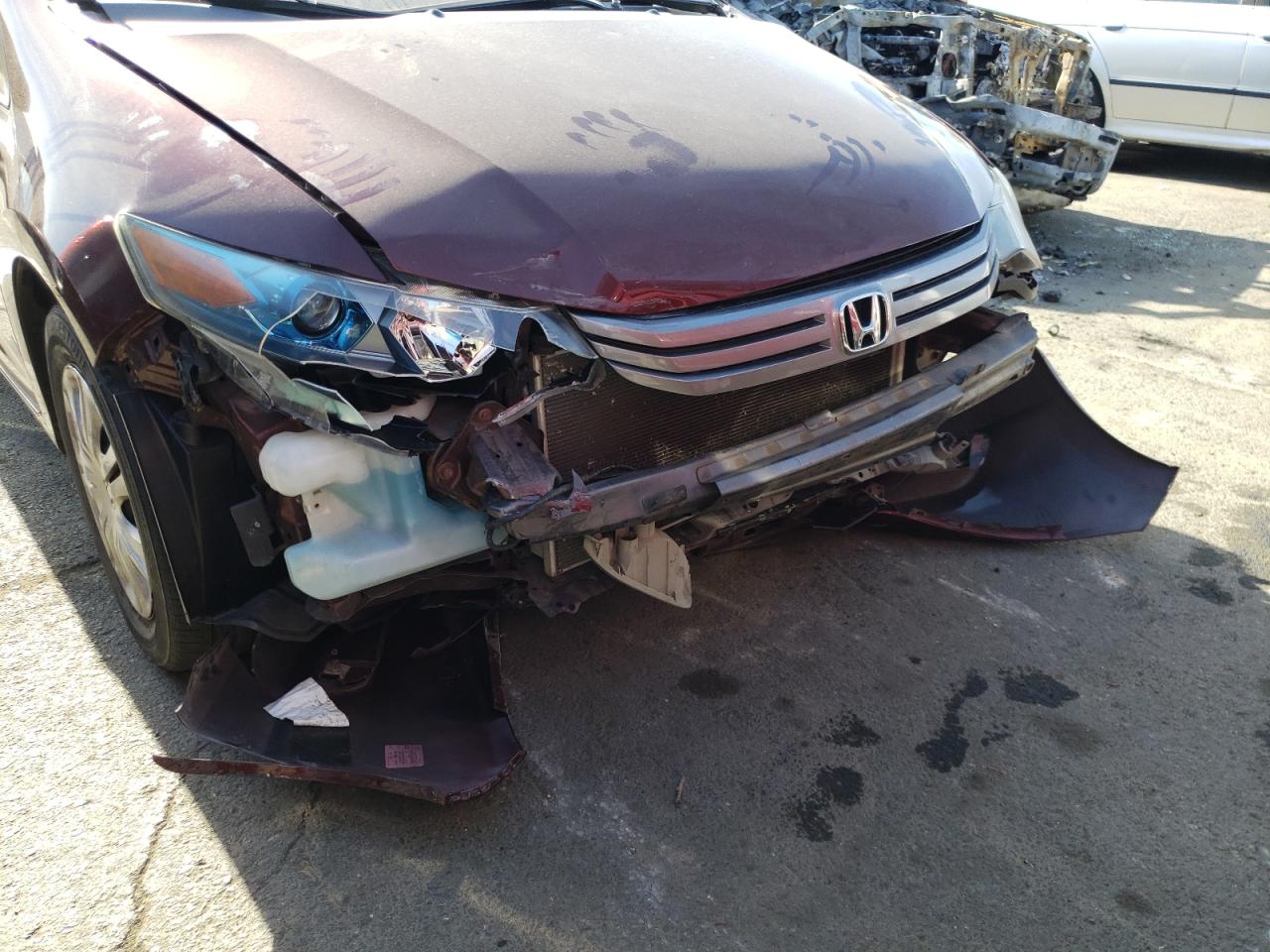 Photo 9 from auction – 2011 HONDA INSIGHT with VIN JHMZE2H37BS009447