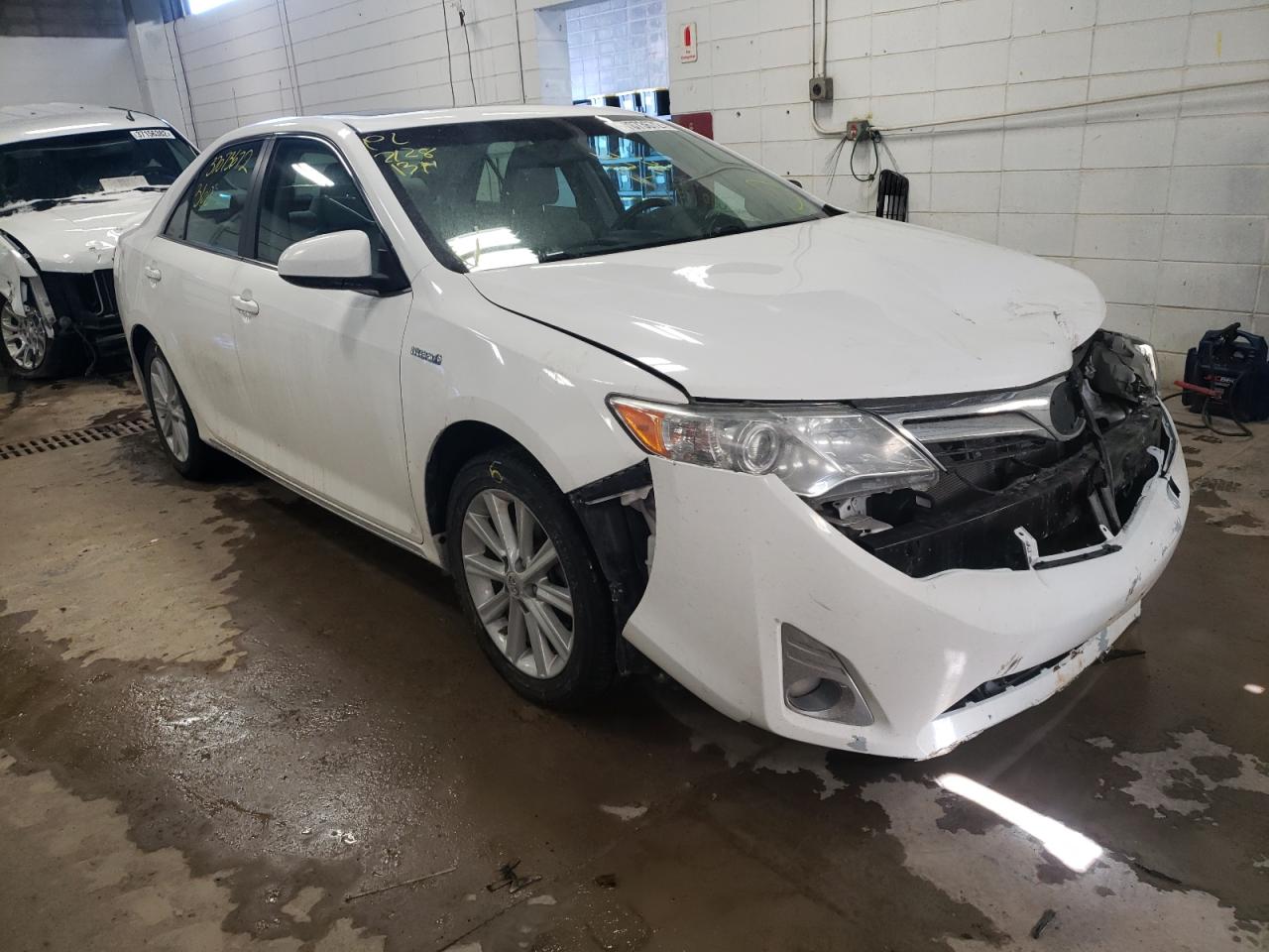 TOYOTA CAMRY HYBR 2012 with VIN 4T1BD1FK2CU057630 - Photo from auction