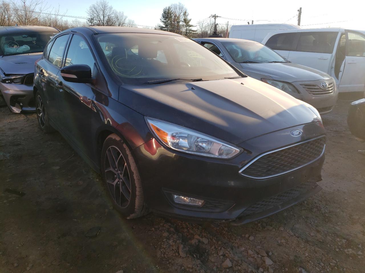 FORD FOCUS SE 2015 with VIN 1FADP3K21FL286743 - Photo from auction