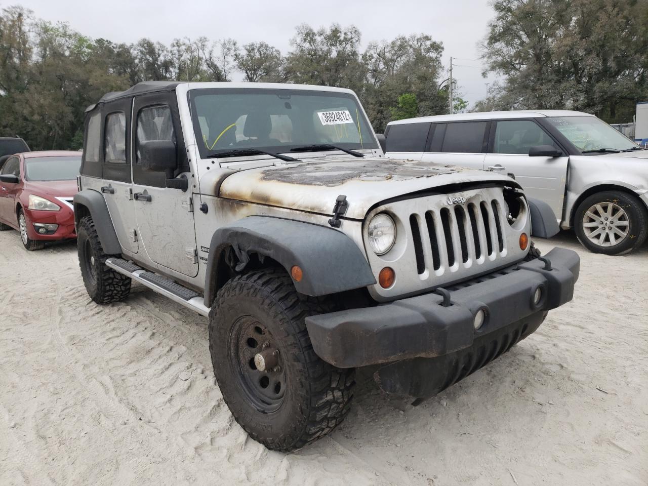 JEEP WRANGLER U 2011 with VIN 1J4BA3H10BL563758 - Photo from auction