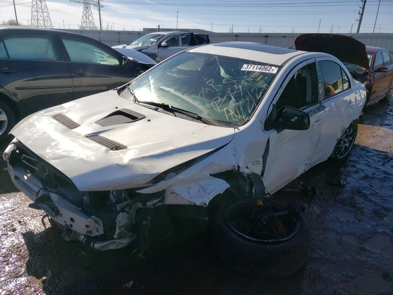 Photo 2 from auction – 2014 MITSUBISHI LANCER EVO with VIN JA32W5FV8EU022771