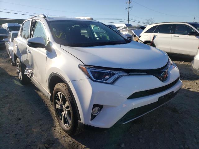TOYOTA RAV4 XLE 2017 with VIN 2T3RFREV8HW674399 - Photo from auction