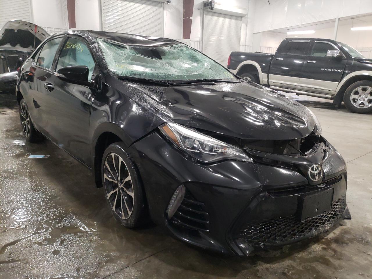 TOYOTA COROLLA L 2017 with VIN 5YFBURHE4HP678611 - Photo from auction