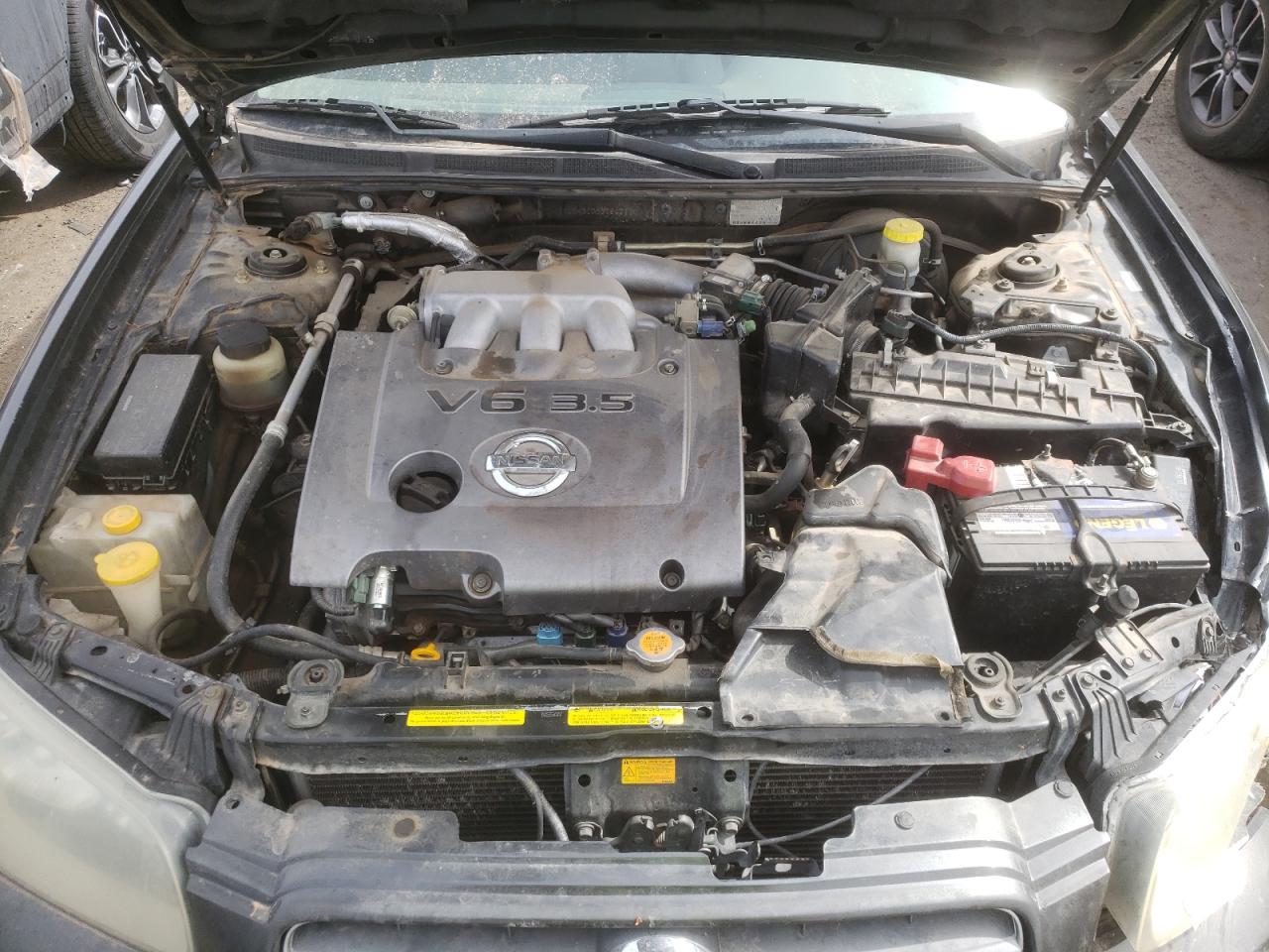 Photo 7 from auction – 2003 NISSAN MAXIMA GLE with VIN JN1DA31D53T517110