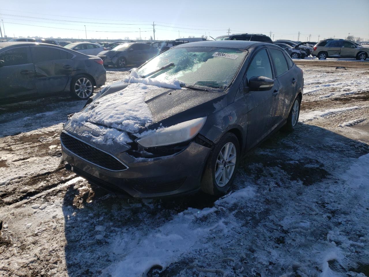 Photo 2 from auction – 2015 FORD FOCUS SE with VIN 1FADP3F24FL210749