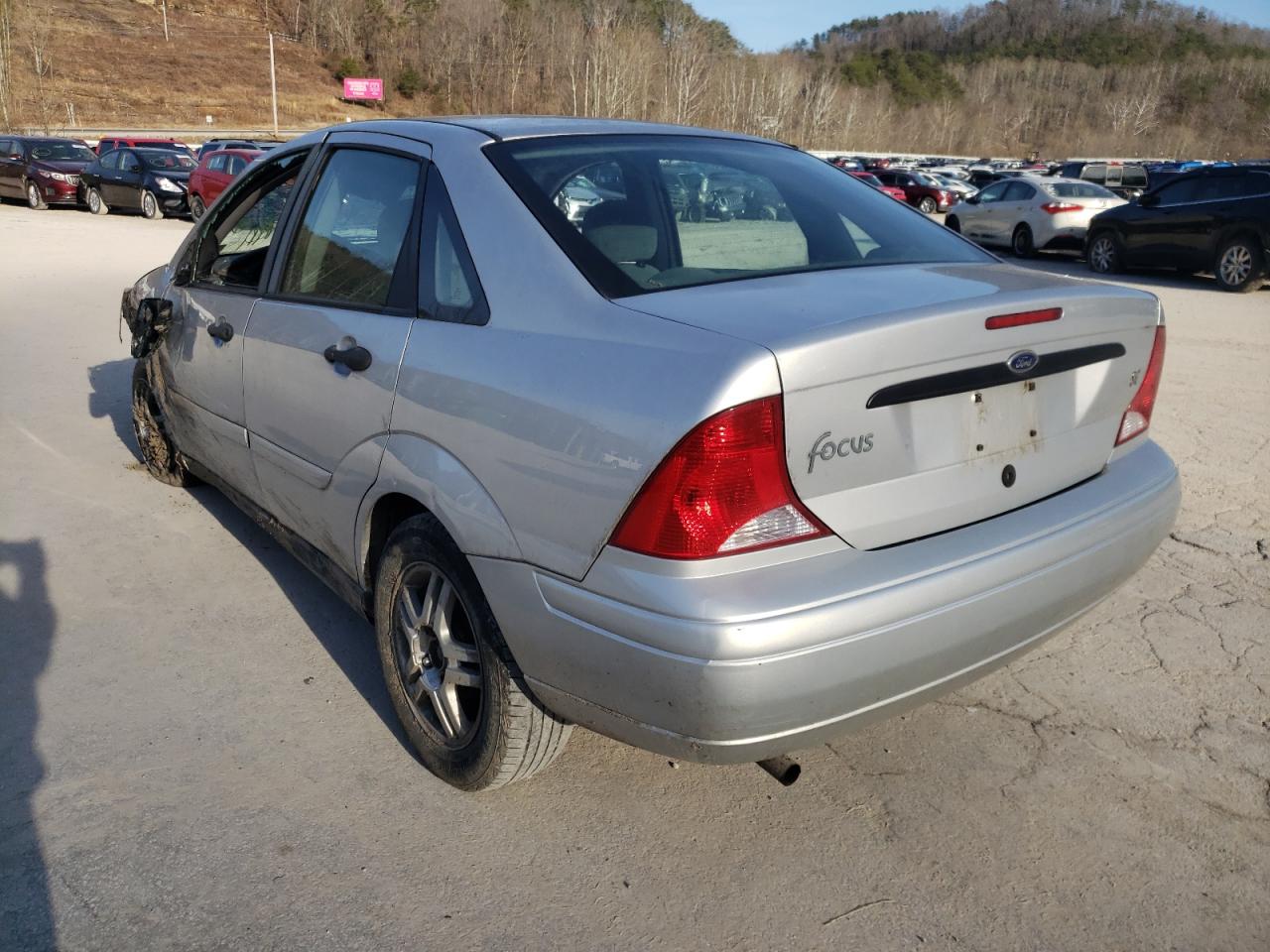 Photo 3 from auction – 2001 FORD FOCUS LX with VIN 1FAFP33P71W306259