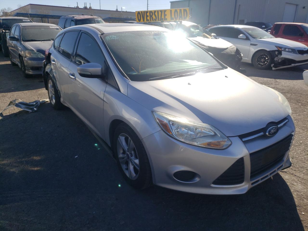 FORD FOCUS SE 2014 with VIN 1FADP3K23EL287634 - Photo from auction