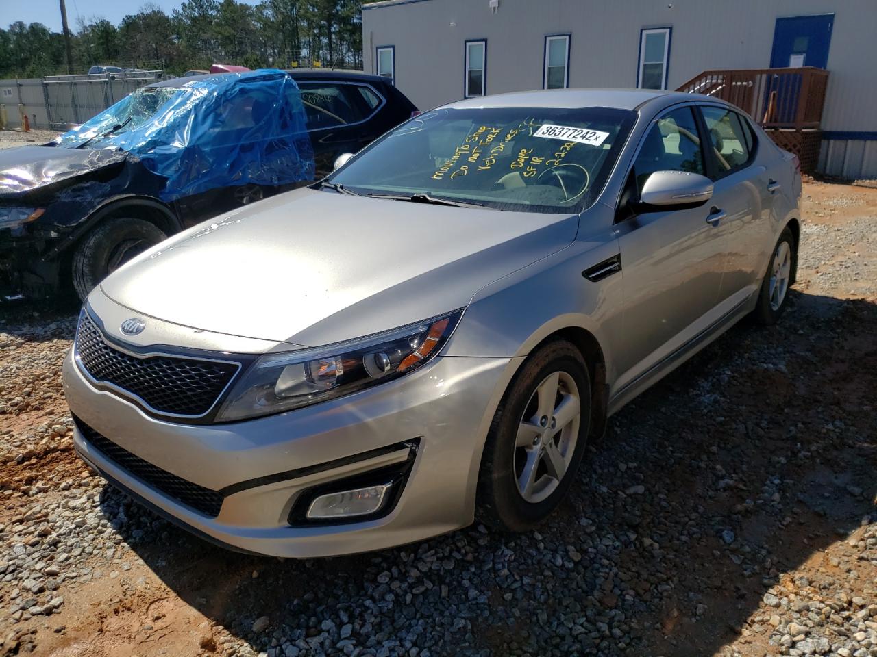 Photo 2 from auction – 2014 KIA OPTIMA LX with VIN KNAGM4A7XE5479380