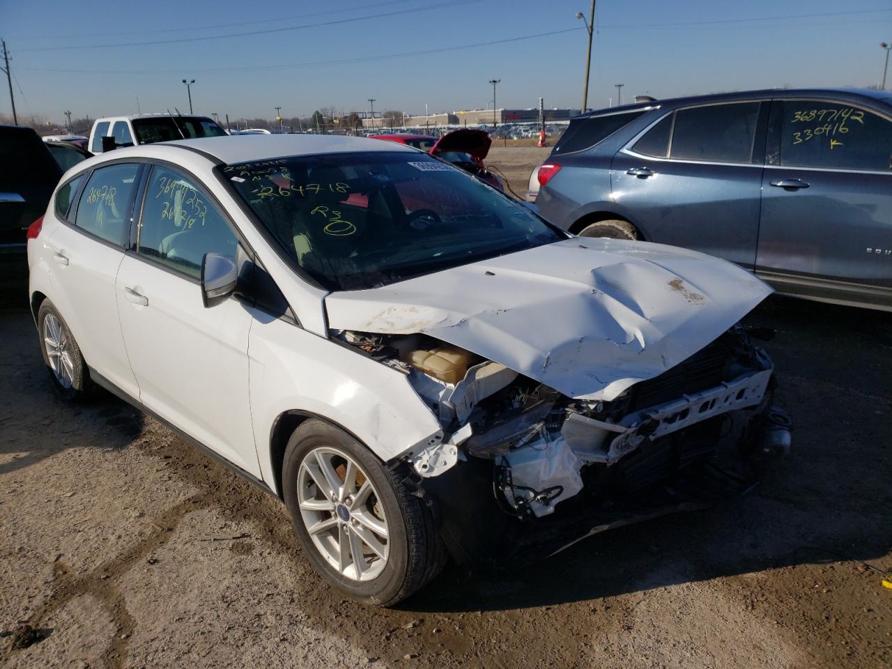 FORD FOCUS SE 2016 with VIN 1FADP3K20GL264718 - Photo from auction