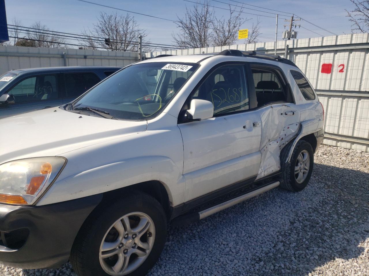 Photo 9 from auction – 2007 KIA SPORTAGE E with VIN KNDJF723477352423