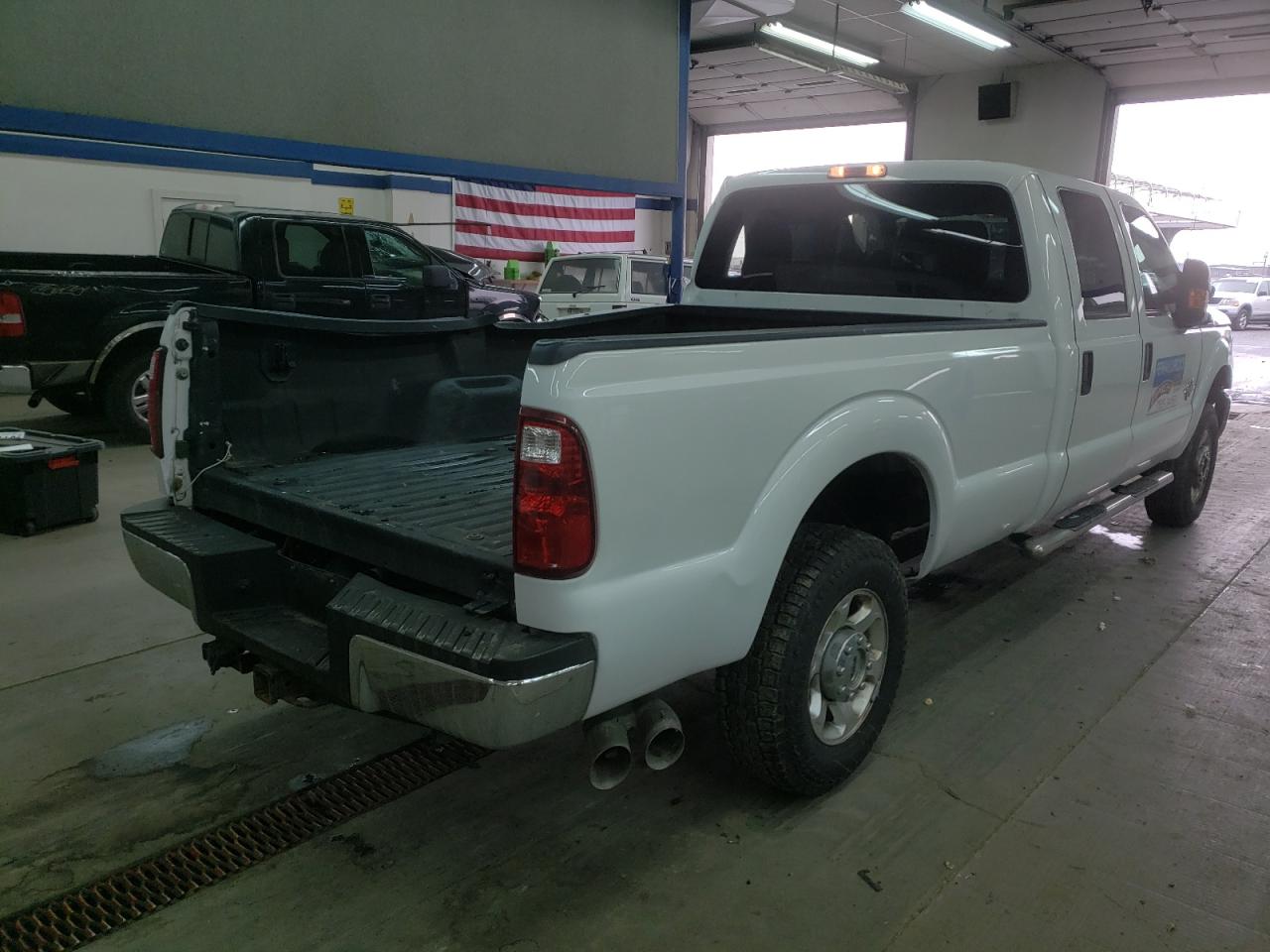 Photo 4 from auction – 2013 FORD F250 SUPER with VIN 1FT7W2BT6DEB74440