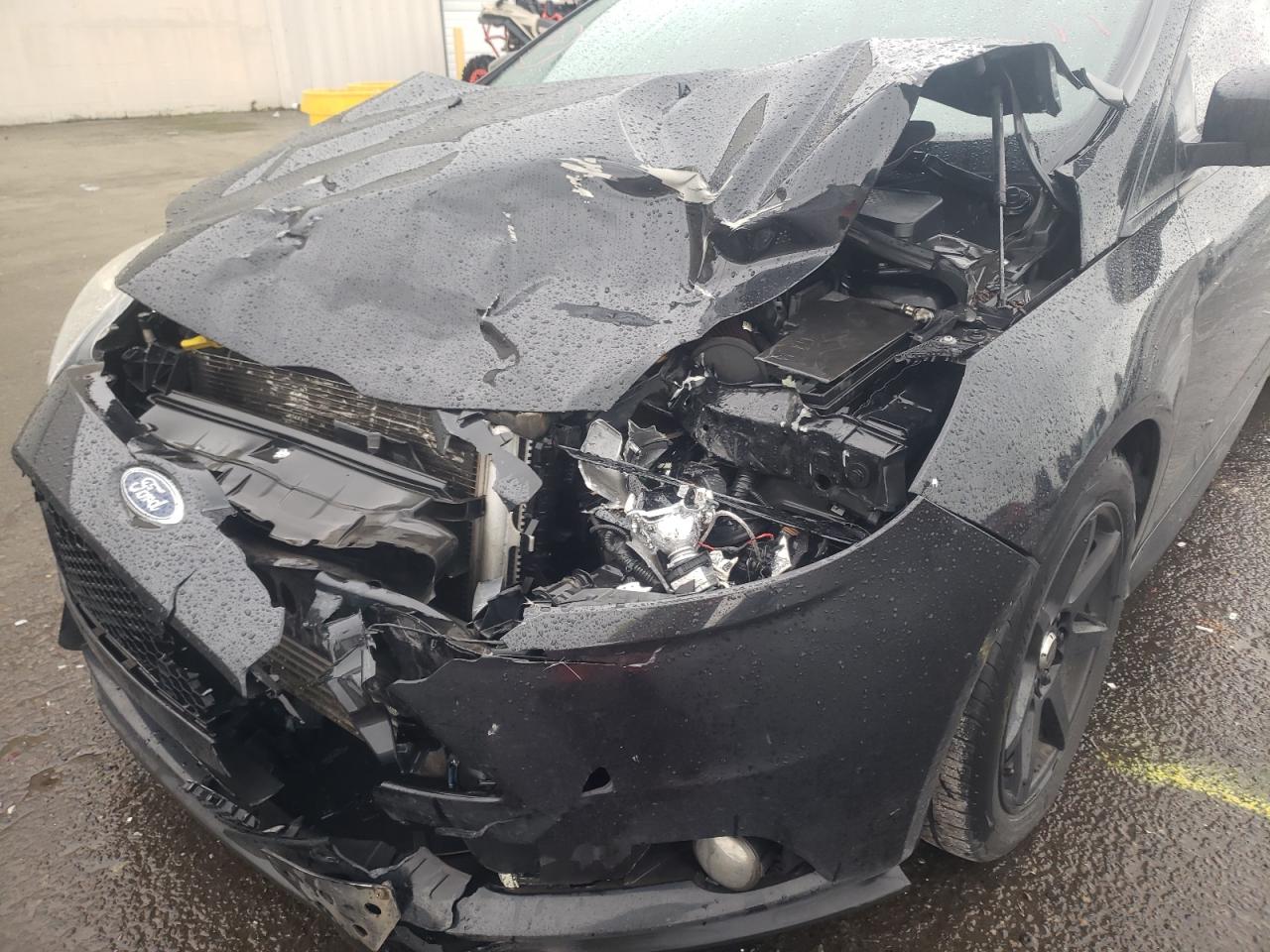 Photo 9 from auction – 2013 FORD FOCUS ST with VIN 1FADP3L93DL185650