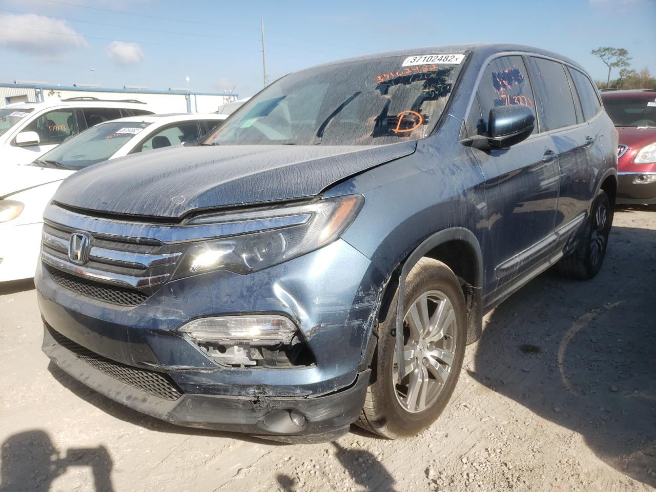 Photo 2 from auction – 2016 HONDA PILOT EXL with VIN 5FNYF5H54GB055240