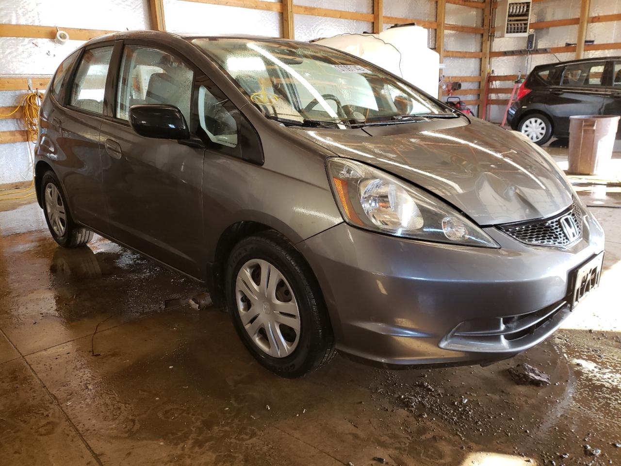 HONDA FIT 2011 with VIN JHMGE8H31BC007357 - Photo from auction