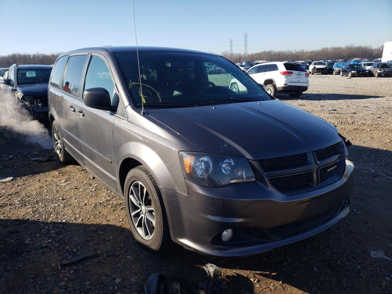 DODGE GRAND CARA 2015 with VIN 2C4RDGEG1FR682590 - Photo from auction