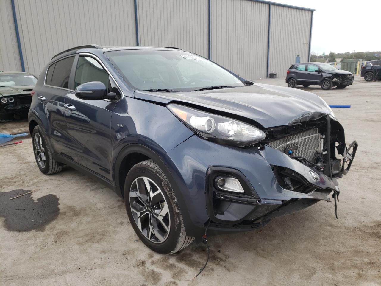 KIA SPORTAGE E 2021 with VIN KNDPNCAC3M7907221 - Photo from auction