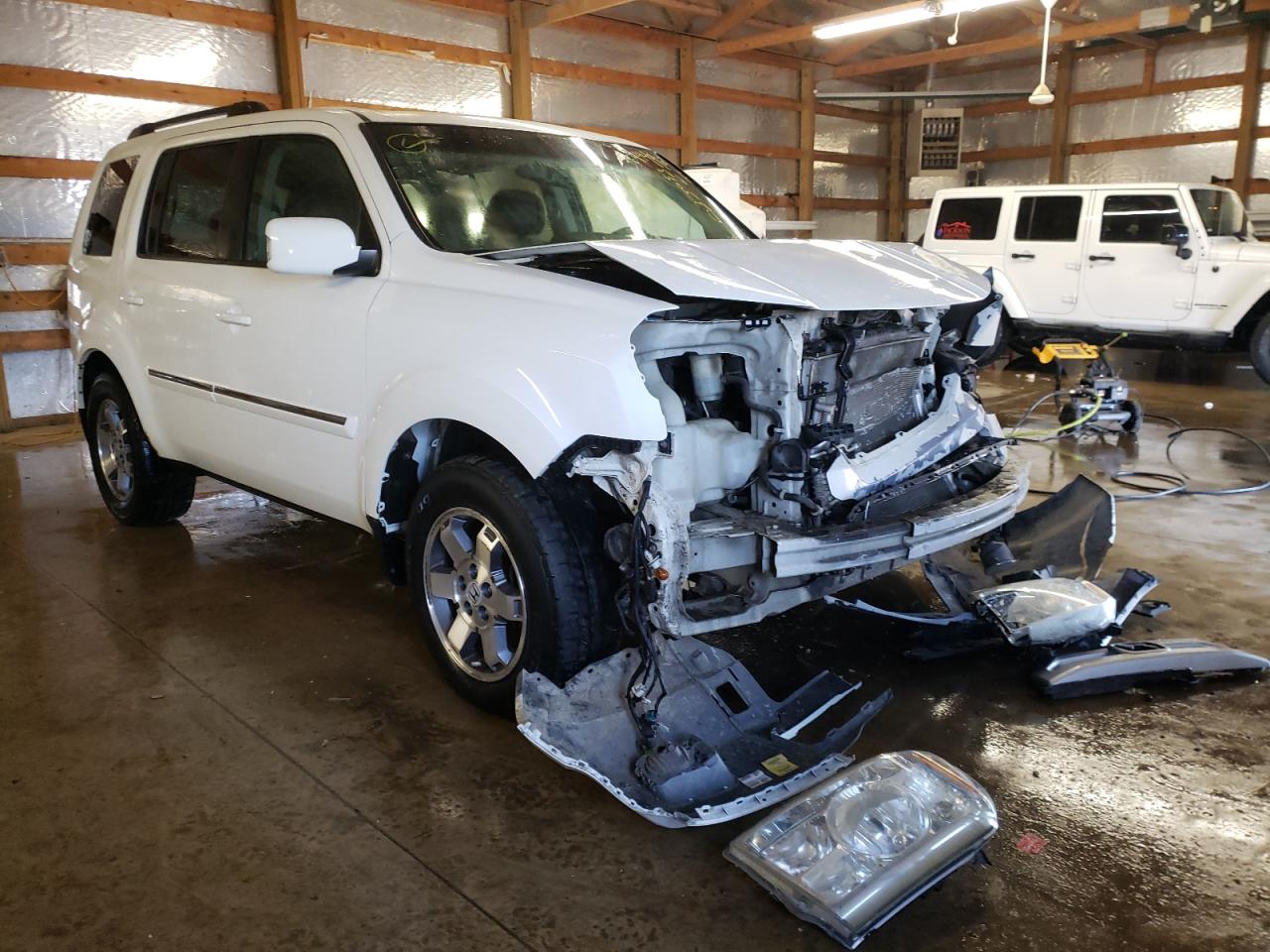 HONDA PILOT TOUR 2009 with VIN 5FNYF48989B033693 - Photo from auction
