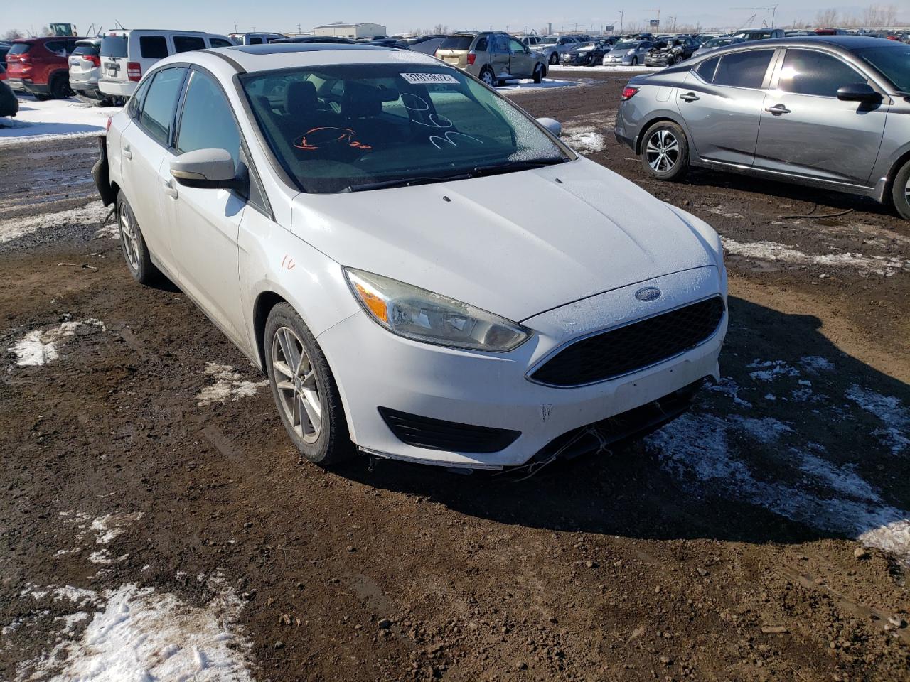 FORD FOCUS SE 2015 with VIN 1FADP3F25FL243047 - Photo from auction