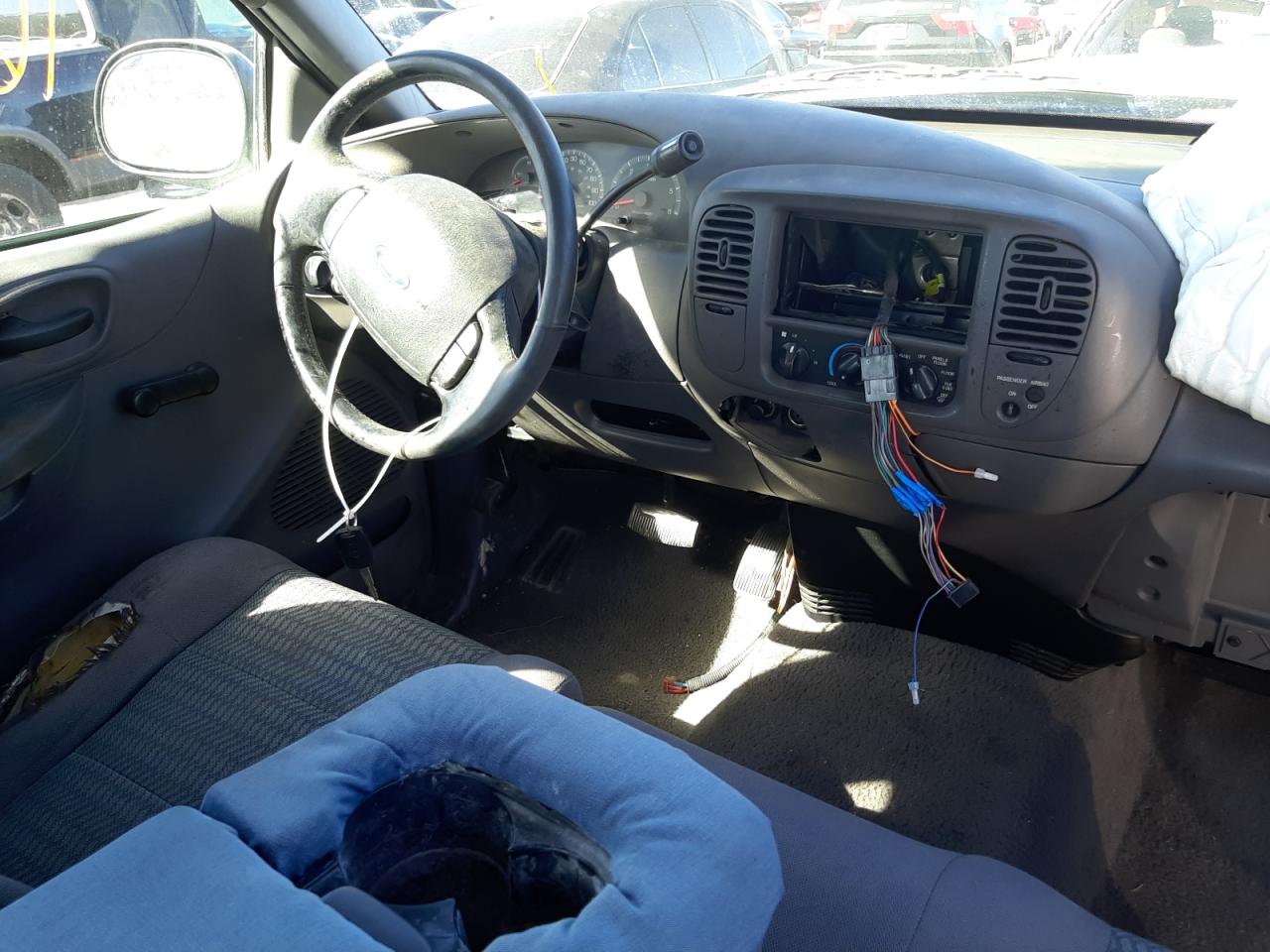 Photo 9 from auction – 2003 FORD F150 with VIN 1FTRX07283KD72303