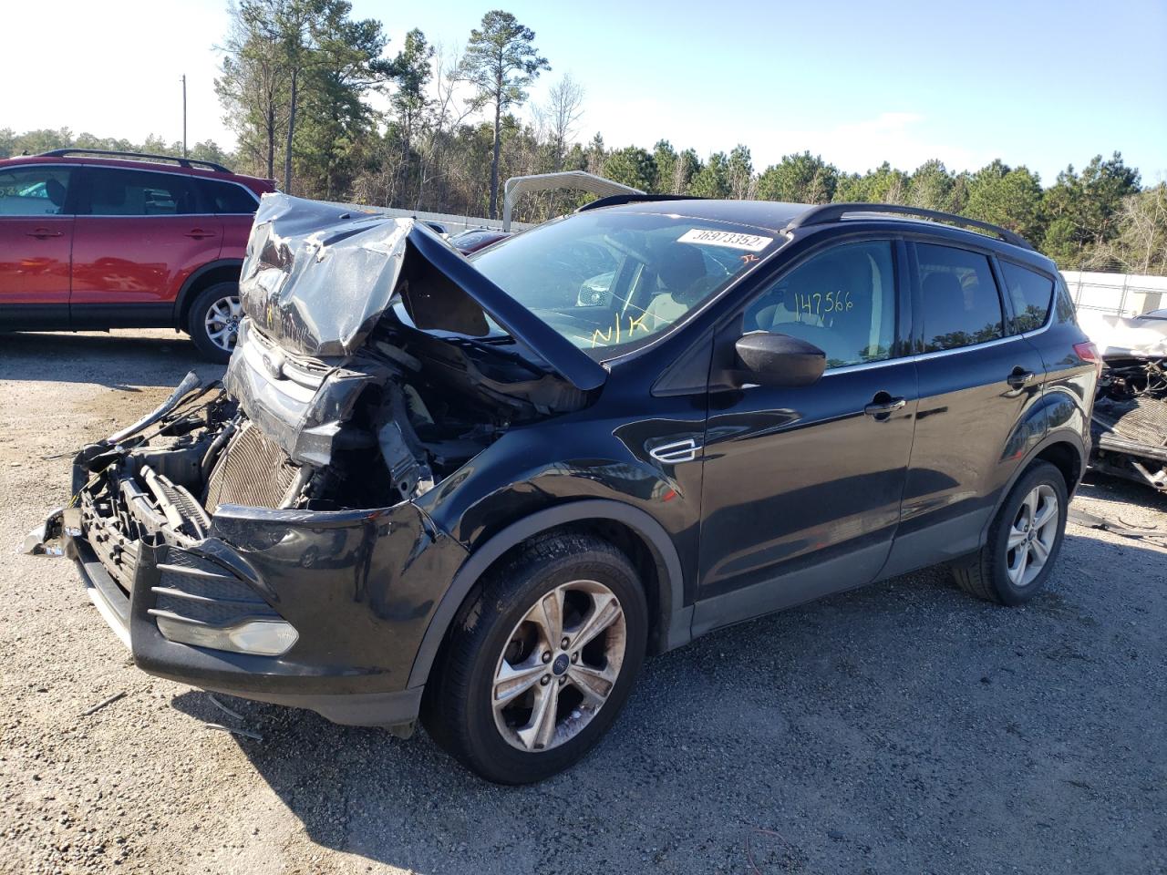 Photo 2 from auction – 2014 FORD ESCAPE SE with VIN 1FMCU0GX3EUB40110