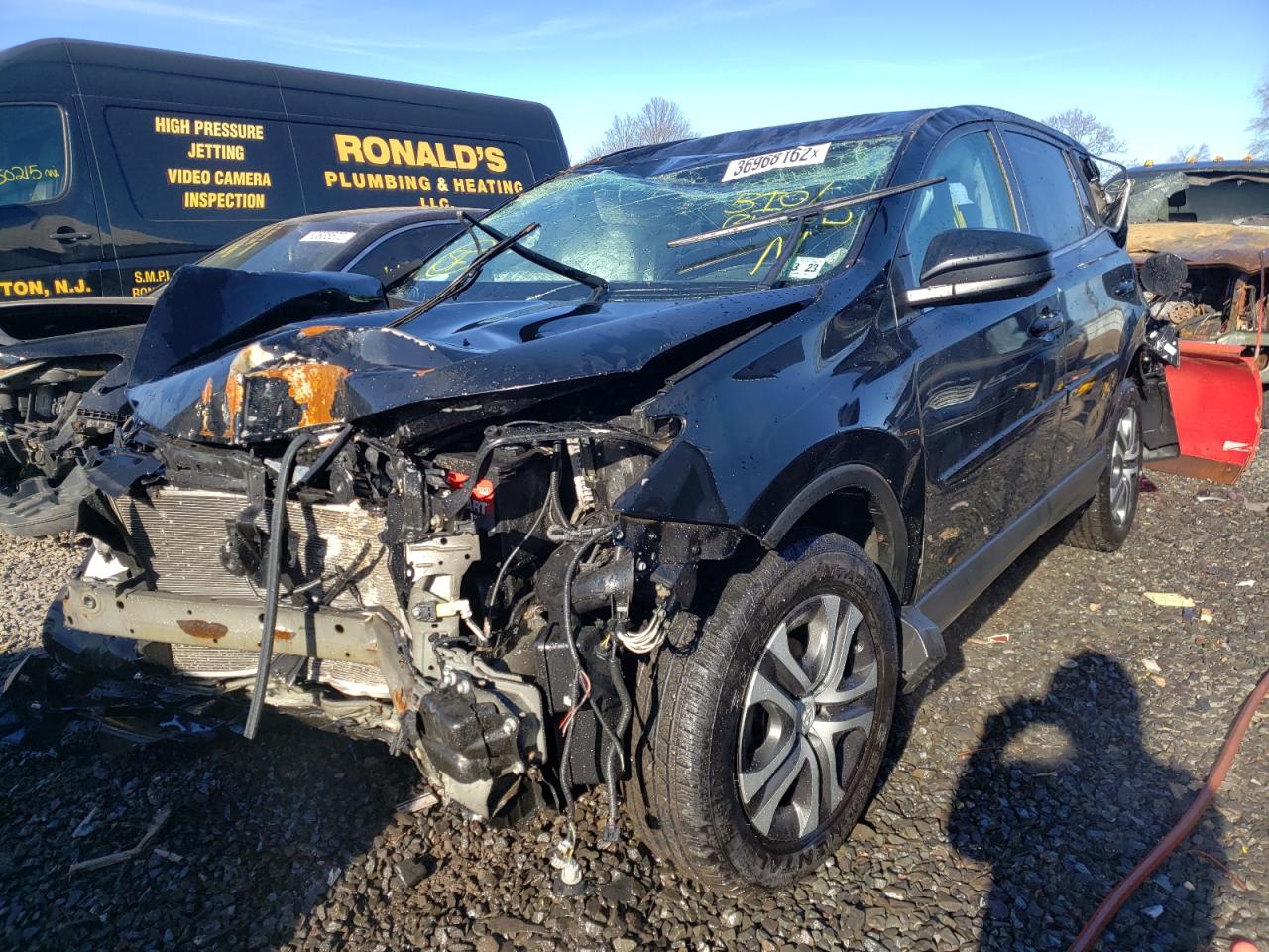 Photo 2 from auction – 2018 TOYOTA RAV4 LE with VIN 2T3BFREV0JW742282