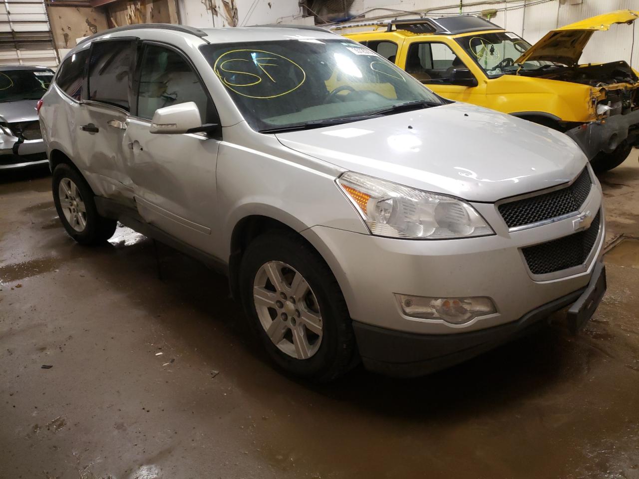 CHEVROLET TRAVERSE L 2010 with VIN 1GNLVFED7AJ214550 - Photo from auction