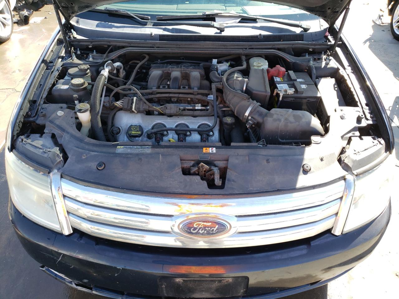 Photo 7 from auction – 2009 FORD TAURUS SE with VIN 1FAHP23W79G109365