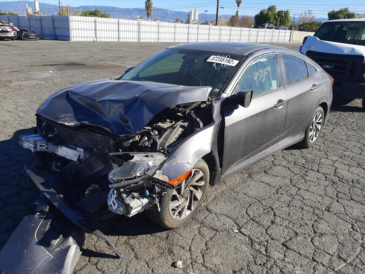 Photo 2 from auction – 2018 HONDA CIVIC EX with VIN 2HGFC2F70JH540710