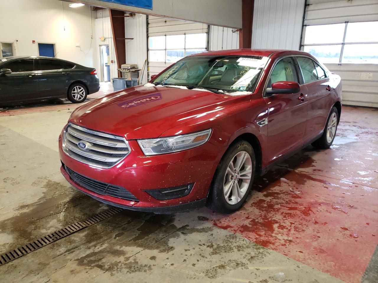 Photo 2 from auction – 2014 FORD TAURUS SEL with VIN 1FAHP2E88EG130895