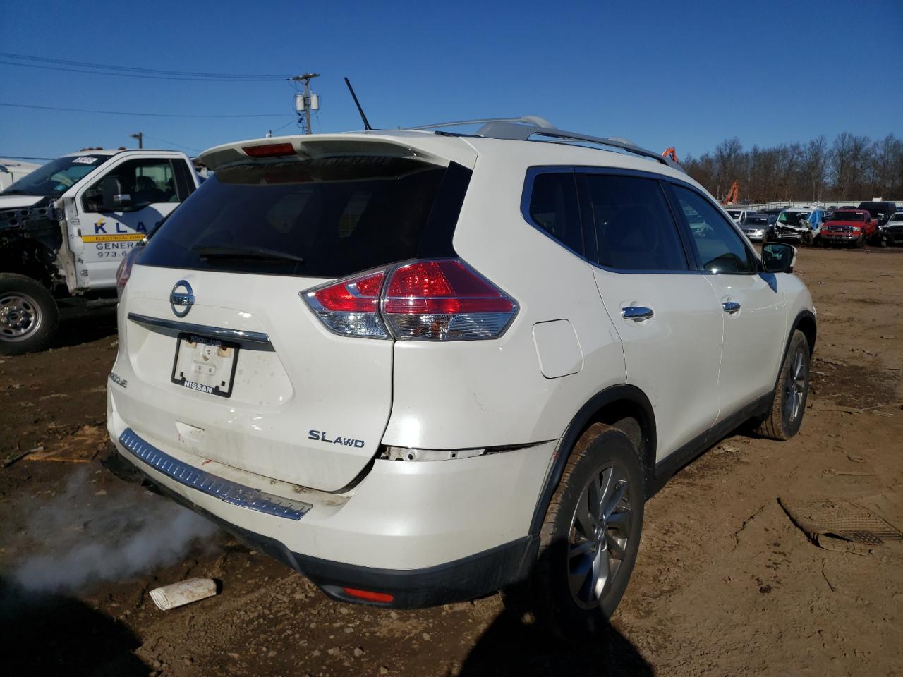 Photo 4 from auction – 2015 NISSAN ROGUE S with VIN 5N1AT2MV5FC814418