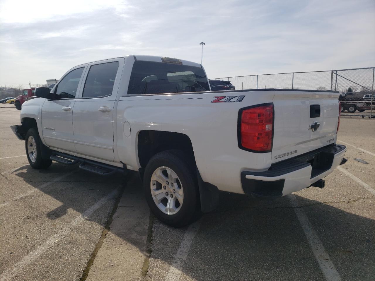 Photo 3 from auction – 2018 CHEVROLET SILVERADO with VIN 3GCUKREC0JG354083